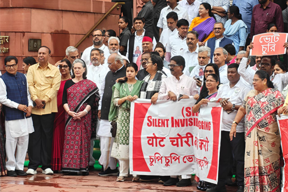 INDIA bloc MPs stage protest against SIR issue, sport '124 Not Out' T-shirts