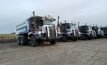 Trucks fitted with autonomous technology at the Zhundong open pit coal mine. Credit: Eacon