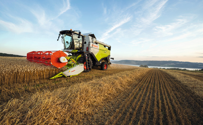 The new Claas Evion range with a trio of five straw walker combines.