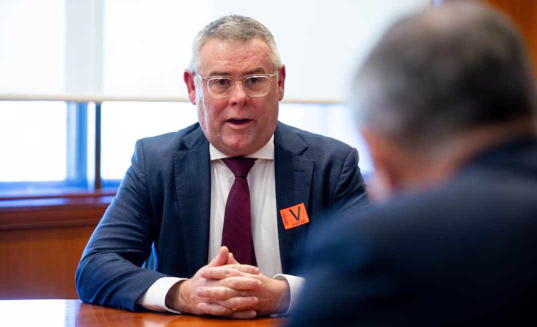 Murray Watt in conversation with WA premier Roger Cook.