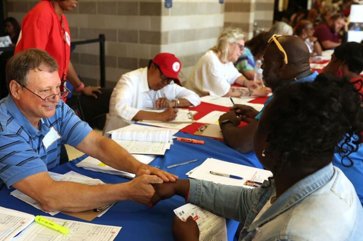 St. Louis tornado aid center opens with free rides, ID help