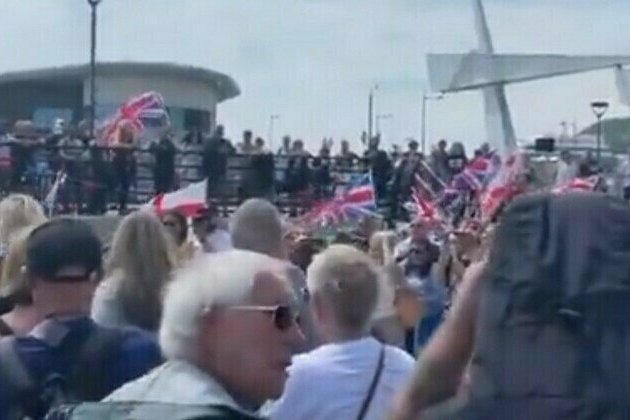 Dozens gather on UK coast to protest migration 