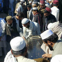 Militants kill and injure dozens in attack on Pakistani military base - media