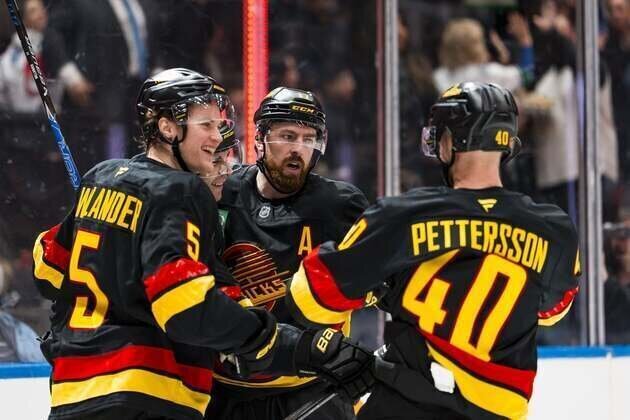 Canucks snap 11-game slide in comeback win vs. Caps