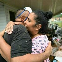 Tears, trauma and unpaid work: why men in tinnies aren't the only heroes during a flood disaster