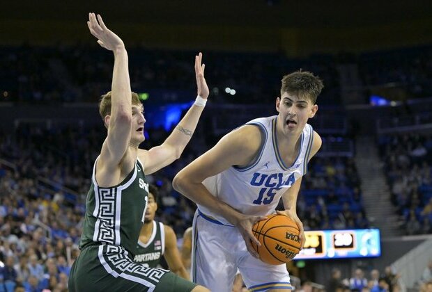 Eric Dailey Jr.'s cluctch hoop carries UCLA past No. 9 Michigan St.