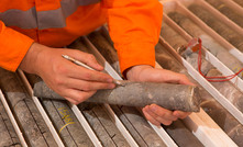 Examining ore samples at Carrapateena