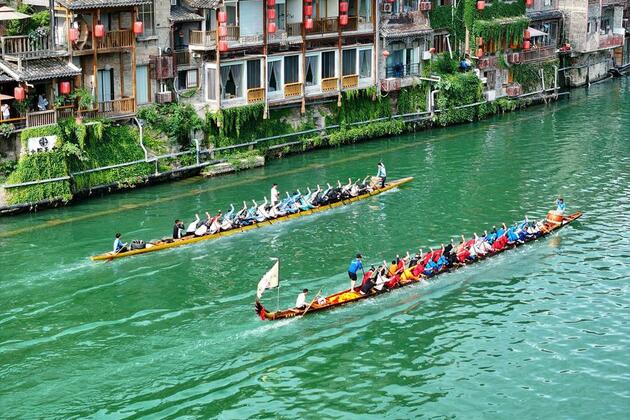 Drumbeats of fitness, tourism echo as dragon boats make waves across China