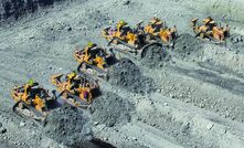 Wolff group equipment conducting a dozer push operation.