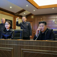 Kim Jong Un and his daughter watch cruise missile tests
