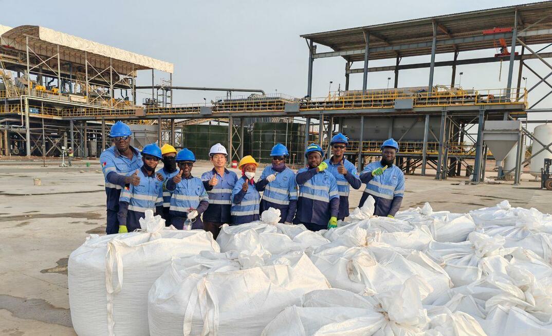 Kodal Minerals processing team with first spodumene