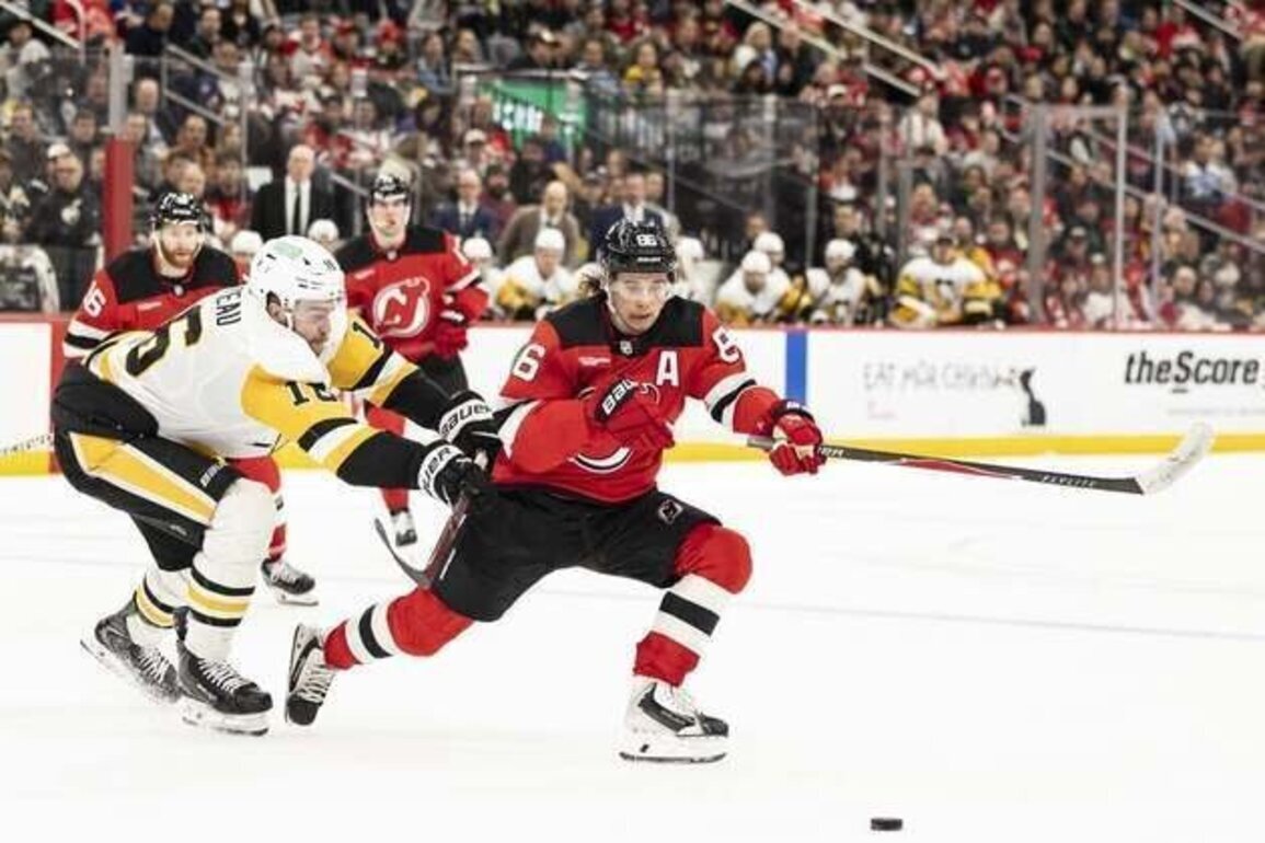 Penguins use flurry to down Devils, return to playoffs