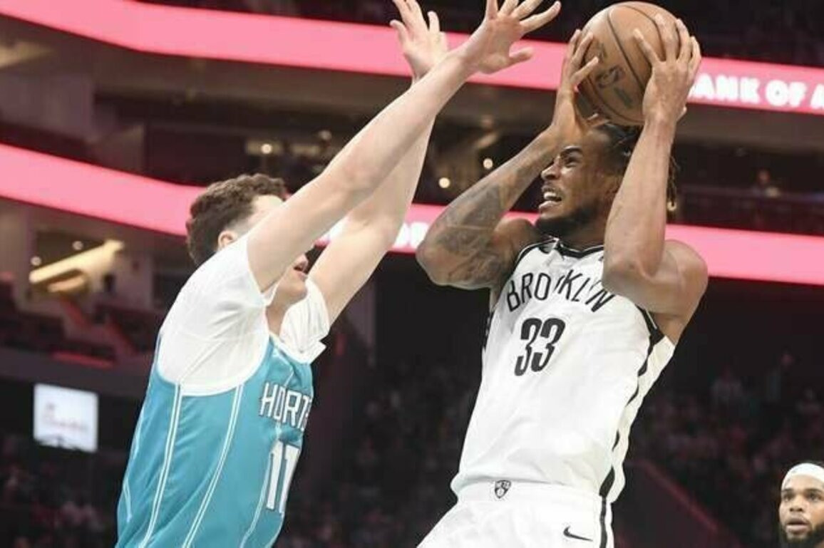 Hot-shooting Hornets overpower Nets in opener