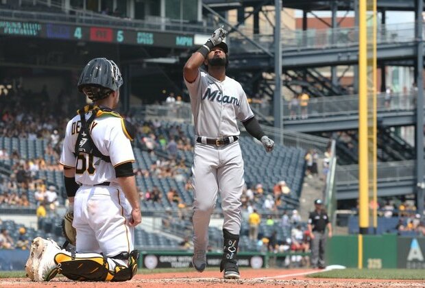 Marlins hold on to win series from Pirates