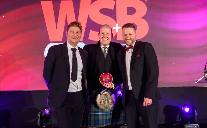 Scott Bennett (left) presents the accolade to Standard Life's Steven Edwards (centre) and Garry Pullar (right)