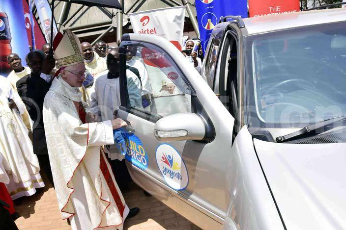  rchbishop lume inspects the car before ugumba was announced winner