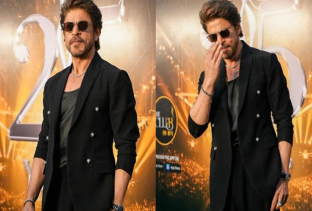 SRK stuns in all-black look at IIFA 2025 green carpet, greets fans with 'adaab'