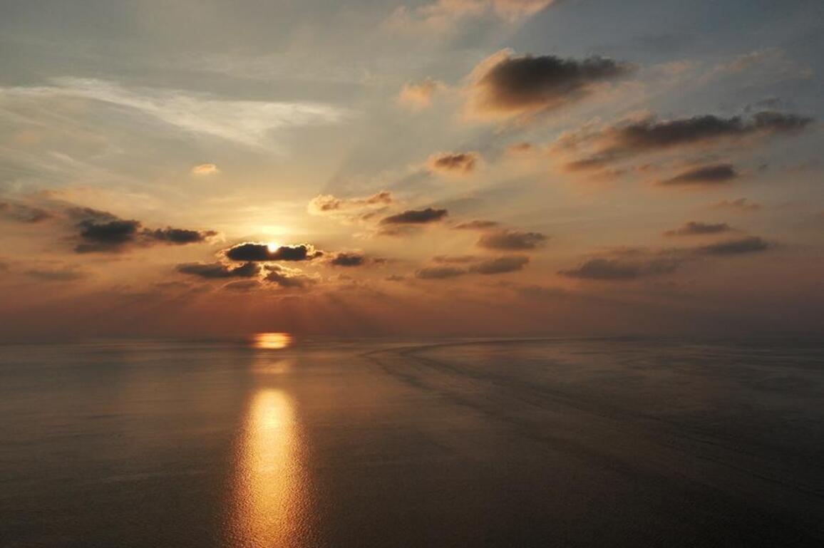 InPics: Beautiful sunset scenery in China's Huangyan Dao