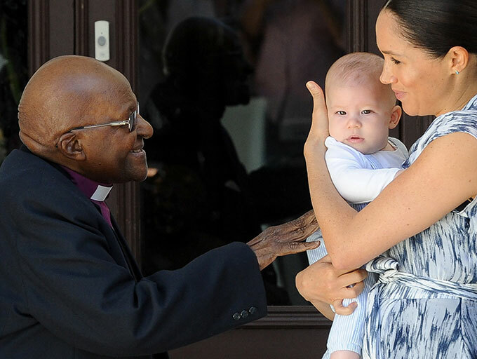 ritains uchess of ussex eghan holds her baby son rchie as she and the uke meet with rchbishop esmond utu and his wife at the utu egacy oundation in ape own hoto by 