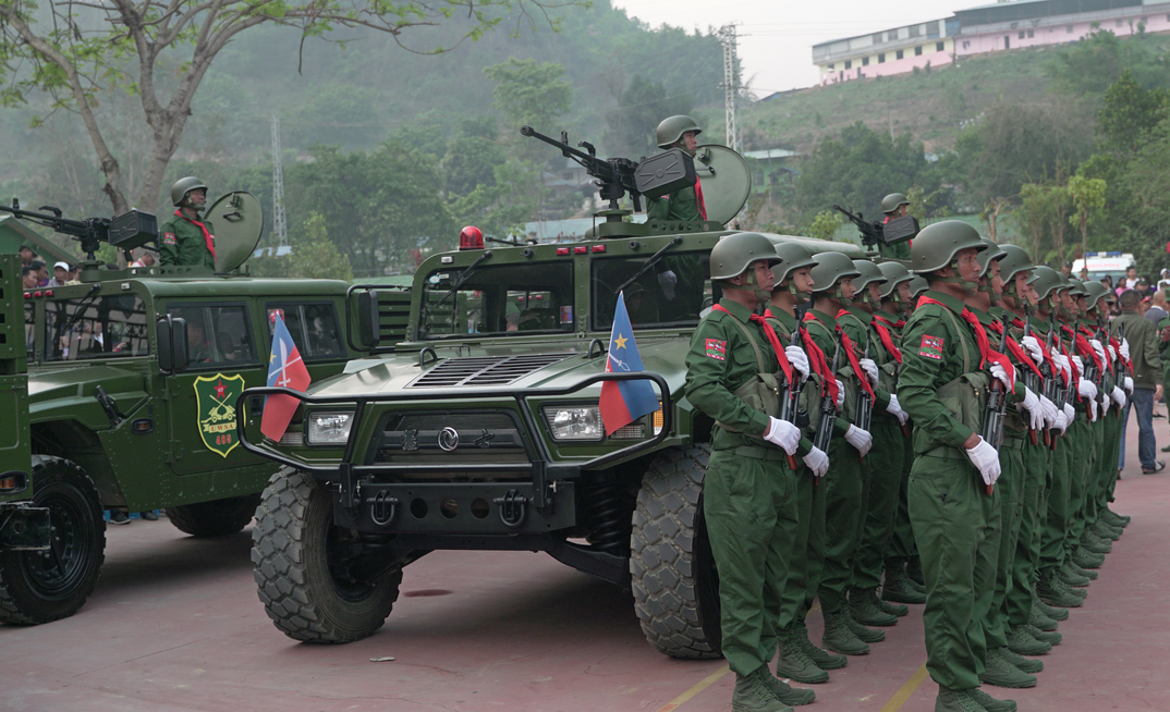 UWSA soldiers stand at attention during ceremonies