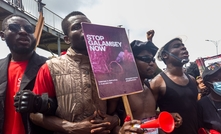  Ghanaians march in protest against illegal gold mining and unlawful arrests on 5 October 2024. Photo: Delali Adogla-Bessa / Shutterstock