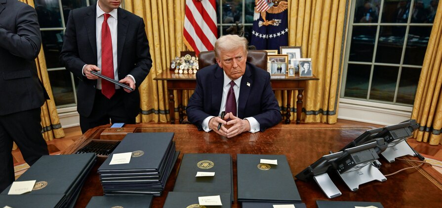 US President Donald Trump signing executive orders