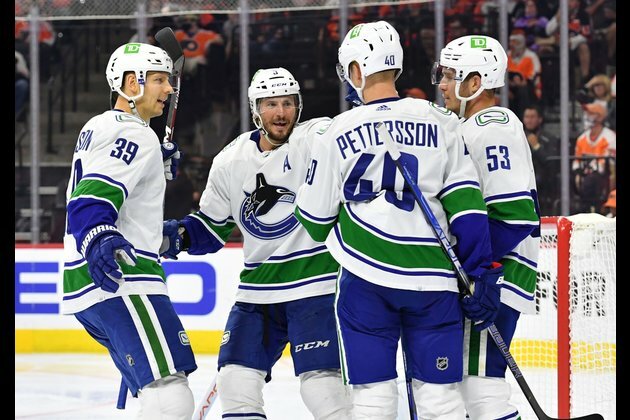 Canucks squander late lead before prevailing in shootout