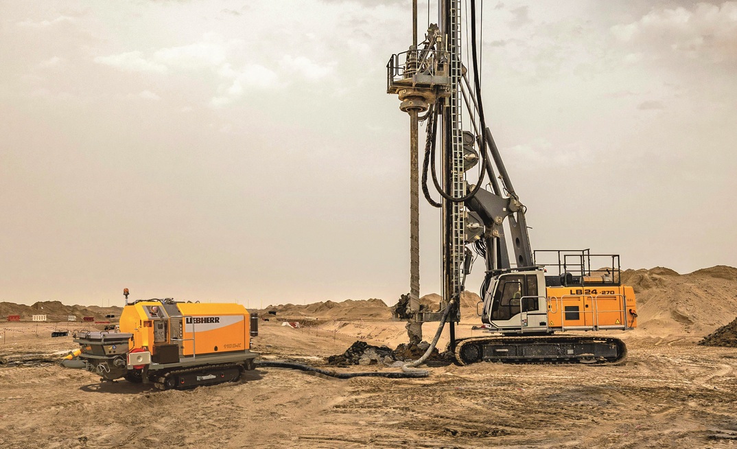  The Liebherr THS 110 D-K crawler concrete pump working in tandem with a Liebherr drilling rig