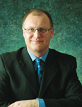 John Carter becomes Travis deputy chief executive