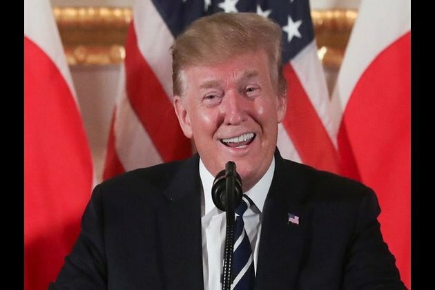 Trump on Japan trip continues scathing remarks on Biden