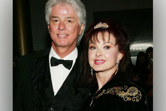 Naomi Judd's widower Larry Strickland recalls she once shot gun at him