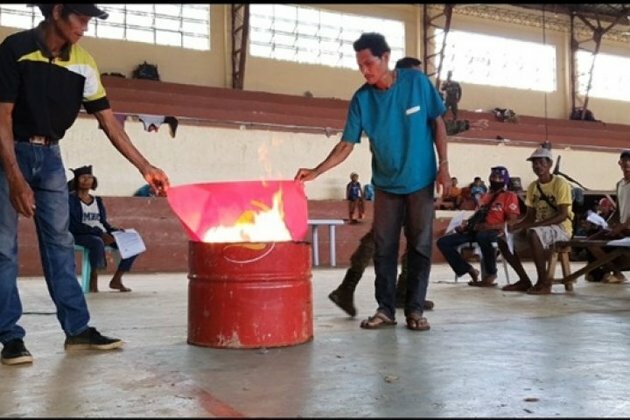 IPs burn CPP-NPA flag, condemn atrocities in Bukidnon