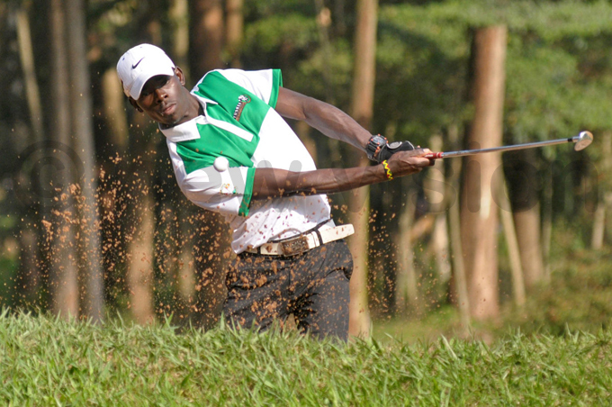 ichael subuga took this photo of golfer onald tile chipping from a bunker during round three action of the ganda pen in ugust tile went on to win the tournament  for the second year running