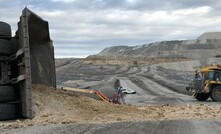 The truck veered into a windrow and rolled onto its side at a New South Wales open cut mine.