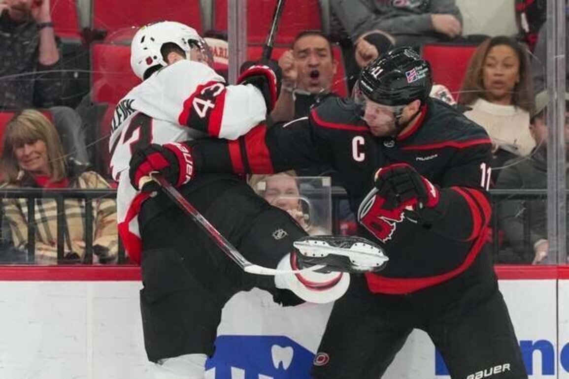 Hurricanes blow lead, come back to edge Senators