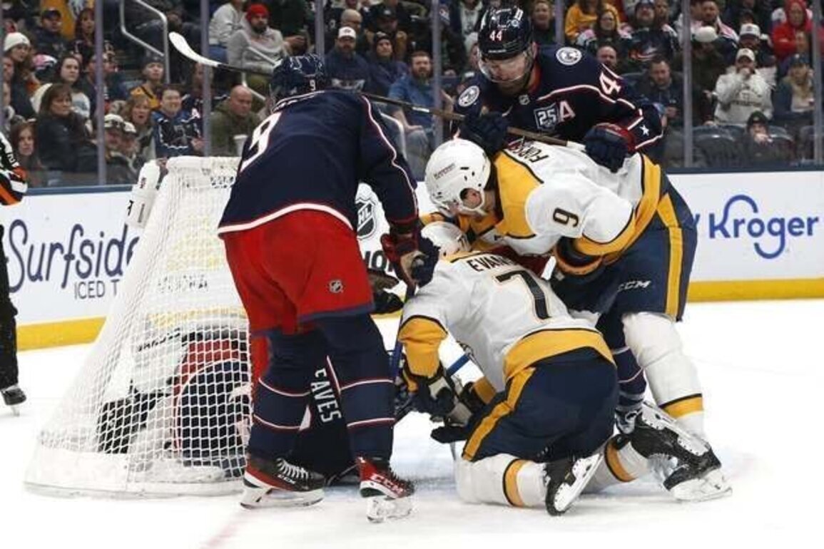 Blue Jackets score twice in third, rally past fading Predators