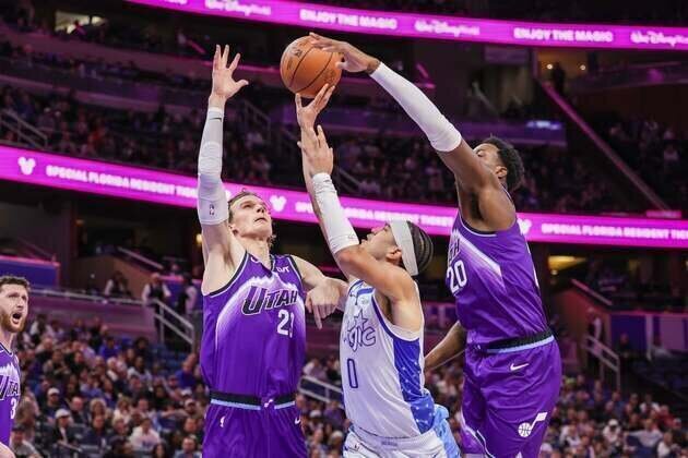 Magic rebound from 17-point hole, take down Jazz