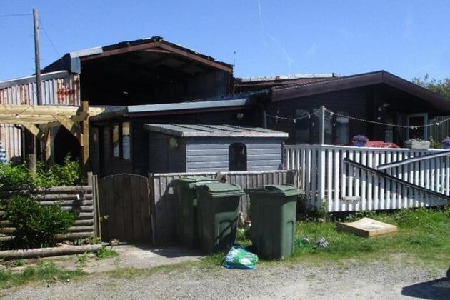 Couple lived in timber lodge for 27 years without permission