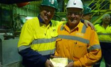 WPG chairman Bob Duffin (left) and Diversified Mineral's Paul Rouse with CJV's first gold bar.