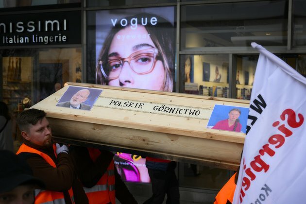Angry miners hold mock funeral of Greta Thunberg and EU suits