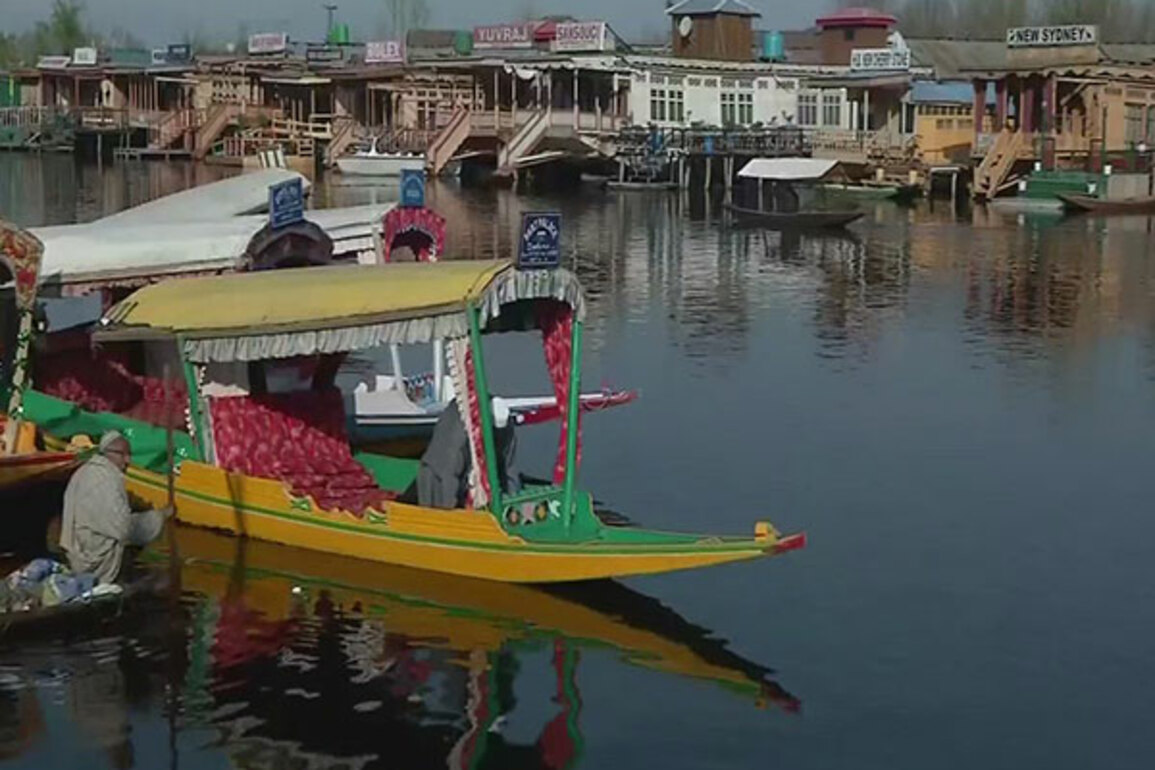 Tourists enjoy shikara ride and beauty of Dal Lake Srinagar