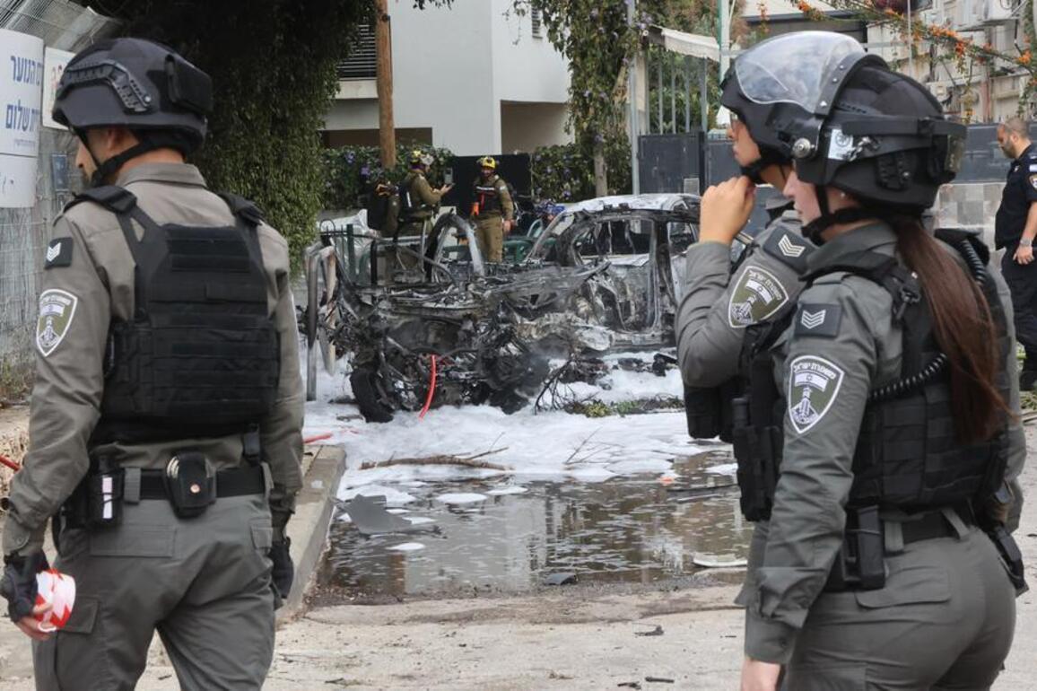 Mideast in Pictures: Iran's missiles, drones continue to strike Tel Aviv, Israel's economic hub