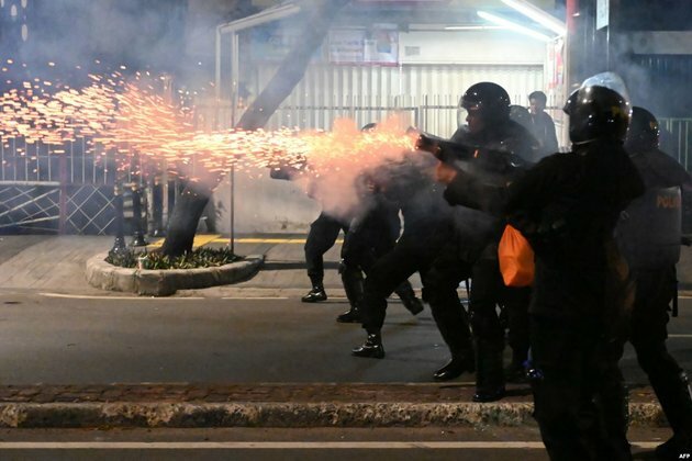 Indonesian Police Break Up Election Protest with Tear Gas