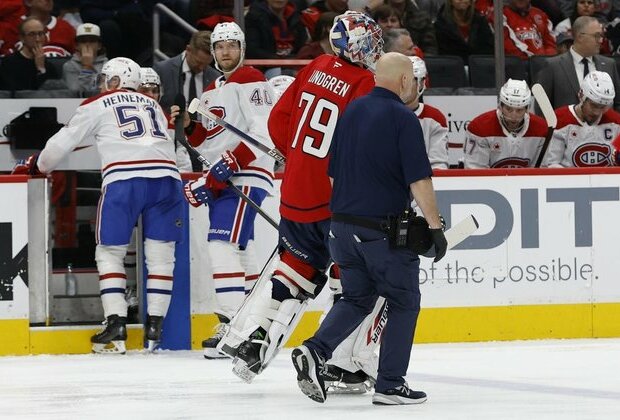 Caps G Charlie Lindgren exits with upper-body injury