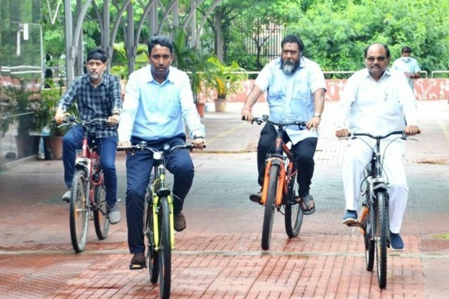 Greater Visakhapatnam Municipal Corporation employees reach office on bicycles to curb air pollution
