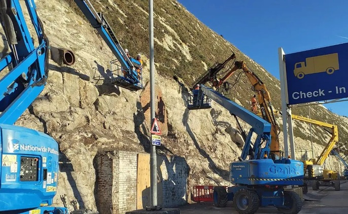 Specialist teams from CAN carrying out stabilisation work on the white cliffs behind the Port of Dover Credit: RSK Group