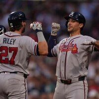 Braves awaken offensively, then hold off Red Sox late