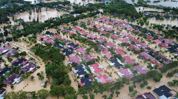 Aceh Utara, Indonesia - 26 November 2025 : aerial view of the flooded PT Pupuk Iskandar Muda complex