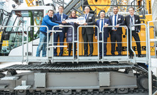  Handing over the keys to a Liebherr HS 8070 at Bauma 