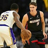Luka Doncic posts triple-double to carry Lakers past Heat